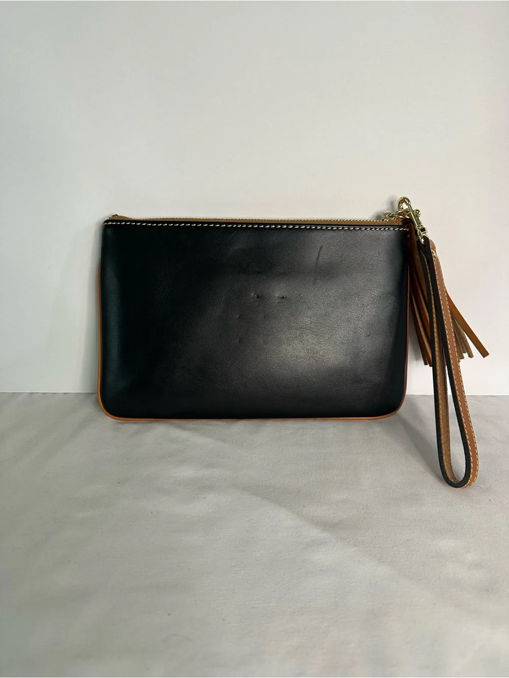 Dooney & Bourke Black Smooth Wexford Leather Carrington Wristlet with Tan Tassel